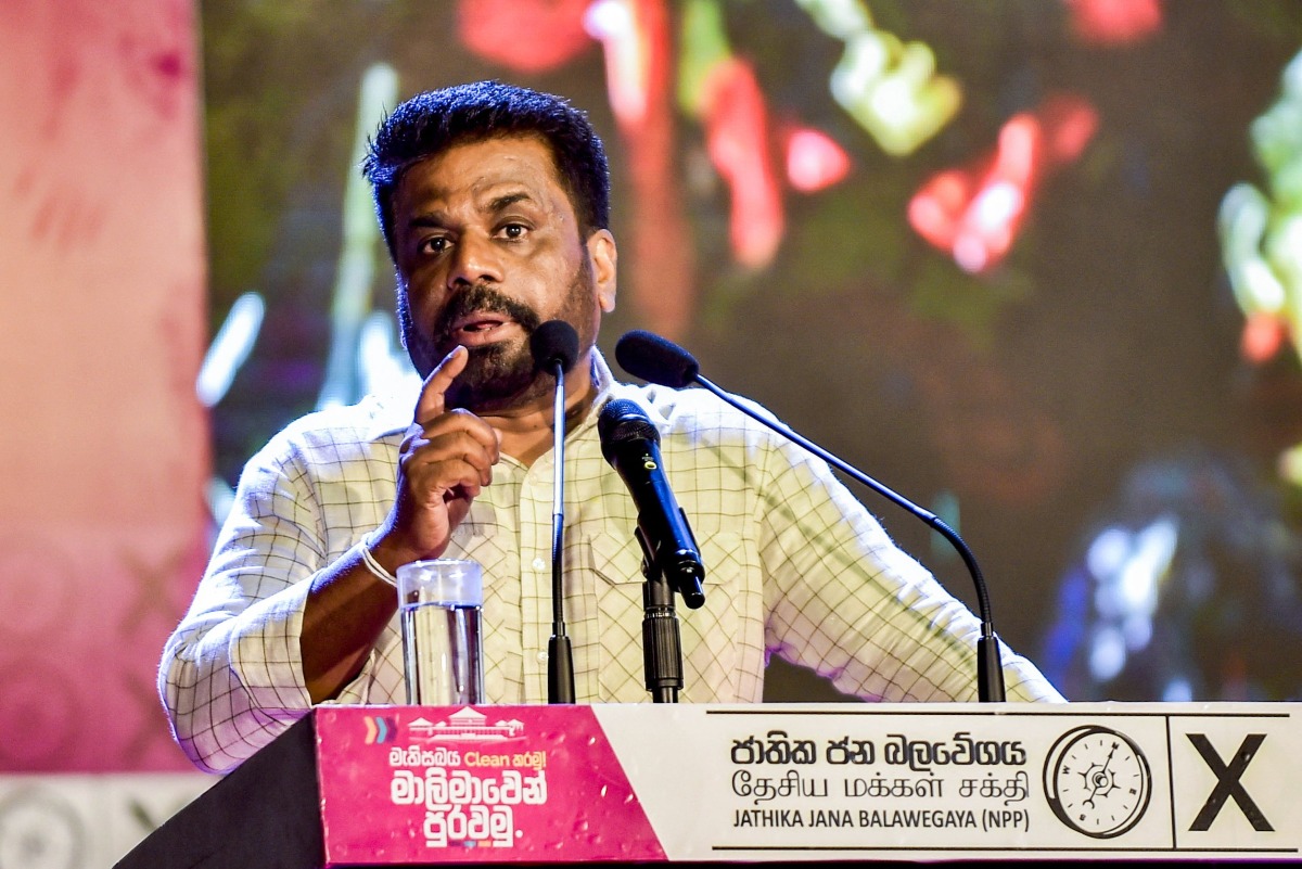 File: Sri Lanka's president and National People's Power (NPP) party leader Anura Kumara Dissanayake addresses his supporters during a rally for parliamentary elections in Colombo on November 11, 2024. (Photo by AFP)

