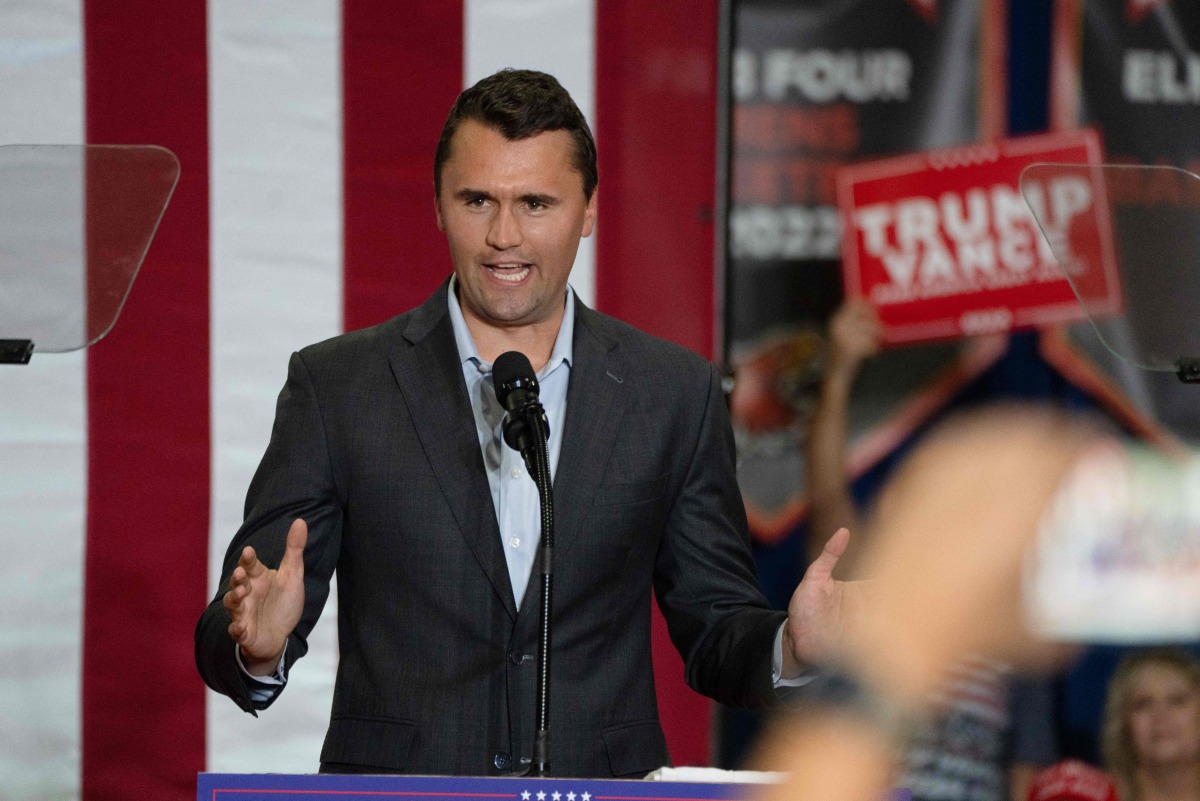 (FILES) Charlie Kirk, Founder and President of Turning Point USA, addresses the crowd at a rally with US Senator and Republican vice presidential candidate JD Vance during a campaign rally at Arizona Christian University Event Center in Glendale, Arizona, on July 31, 2024. (Photo by Laura SEGALL / AFP)
