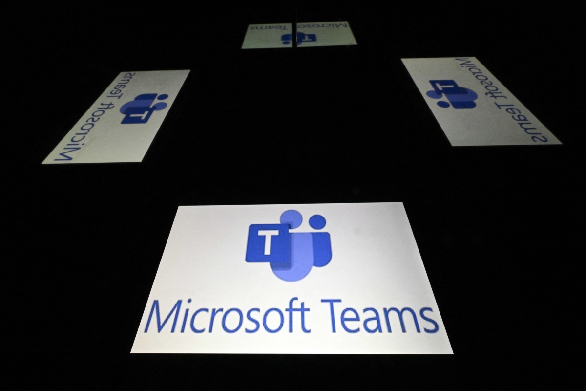 This photograph shows screens displaying the logo of Teams, a collaboration application developed by Microsoft, offering workspace chat and video conferencing, file storage, and integration of proprietary and third-party applications and services in Toulouse, southern France, on January 15, 2025. Photo by Lionel BONAVENTURE / AFP