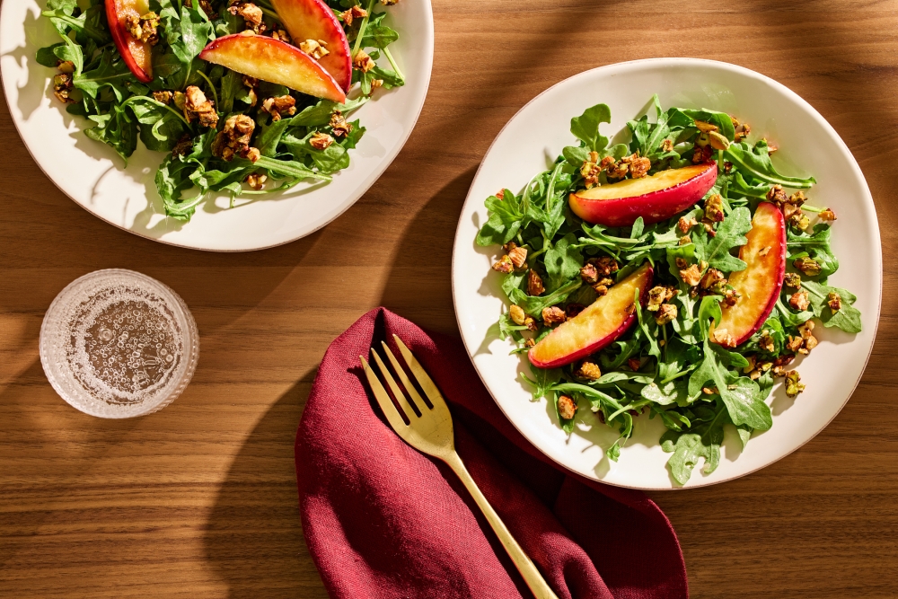 Arugula Salad With Sauteed Apples and Nuts. Picture: Tom McCorkle; food styling by Gina Nistico/Both for the Washington Post