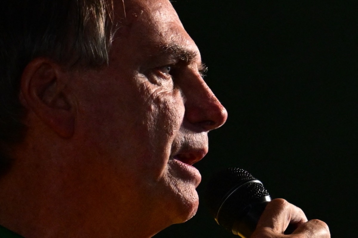 (FILES) Brazil's former President Jair Bolsonaro speaks during the launch of Alexandre Ramagem痴 pre-candidacy for the Rio de Janeiro mayoral elections in Rio de Janeiro, Brazil, on March 16, 2024. (Photo by Pablo PORCIUNCULA / AFP)
