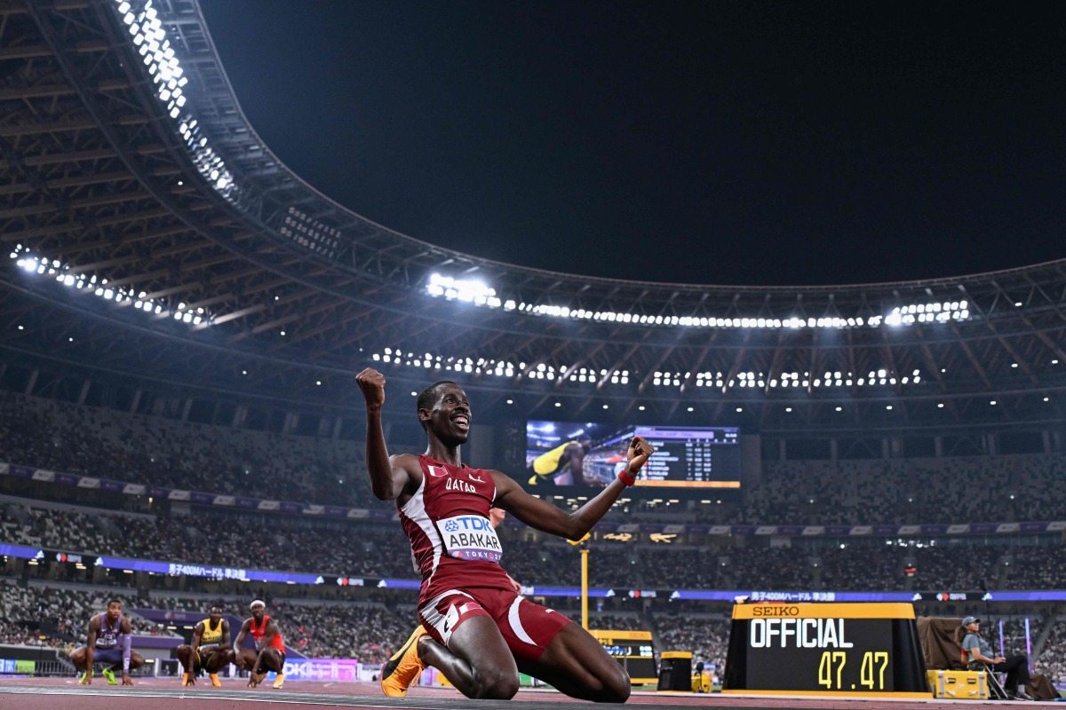 Qatar’s Ismail Abakar celebrates after qualifying for the men’s 400m hurdles final. AFP

