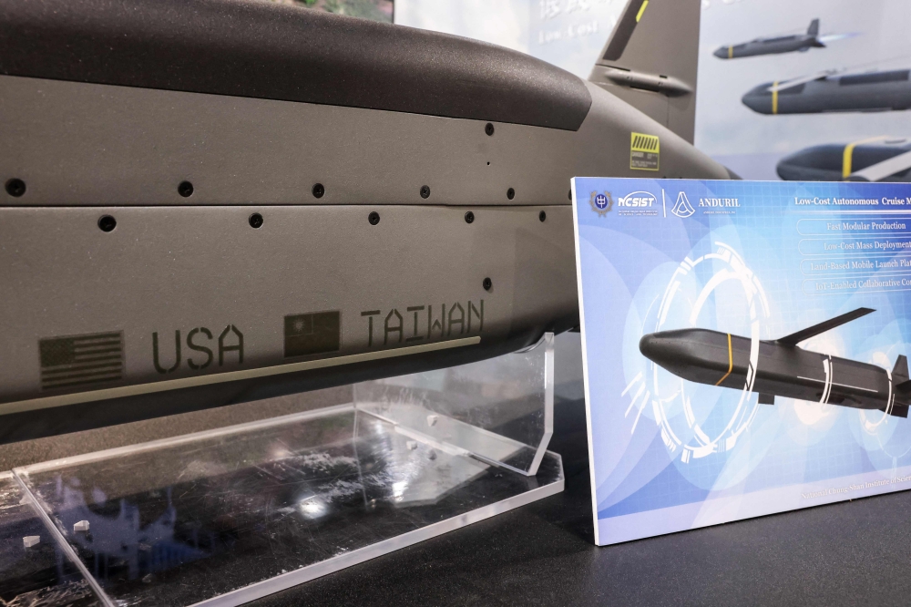 Signs of the US and Taiwan symbolising bilateral cooperation are seen on the Barracuda-500, a low-cost autonomous cruise missile jointly developed by NCSIST and US company Anduril, during the Taipei Aerospace & Defense Technology Exhibition in Taipei on July 18, 2025. (Photo by I-Hwa Cheng / AFP)