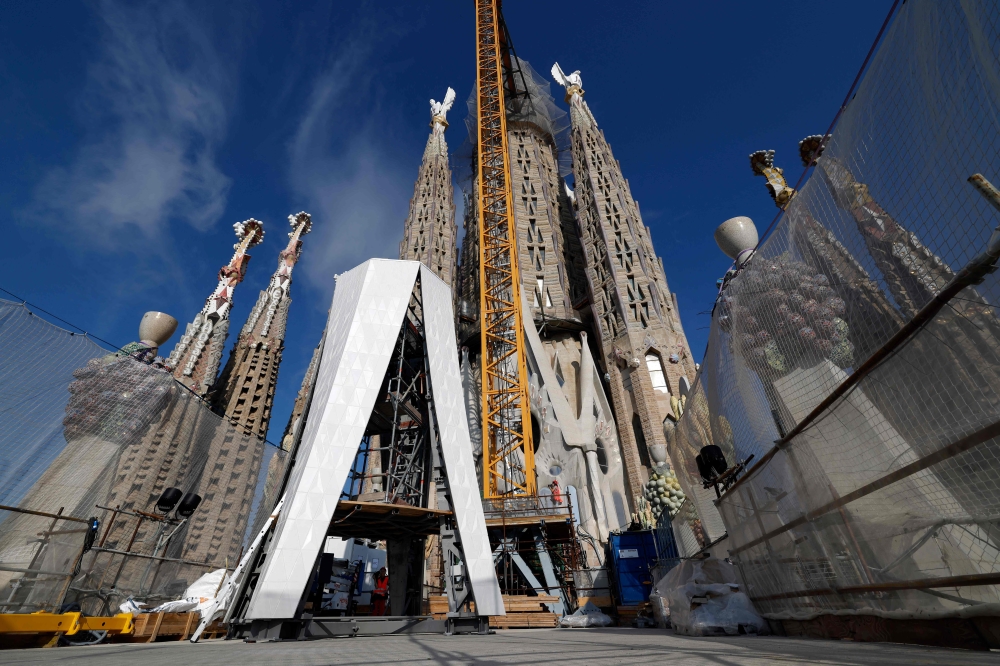 The current progress of the construction of the Sagrada Familia basilica on September 18, 2025. (Photo by Lluis Gene / AFP)