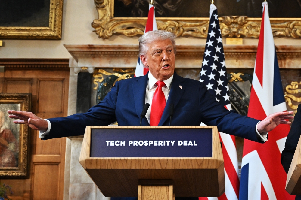 US President Donald Trump gestures during a joint press conference with Britain's Prime Minister Keir Starmer on September 18, 2025. (Photo by Leon Neal / POOL / AFP)
