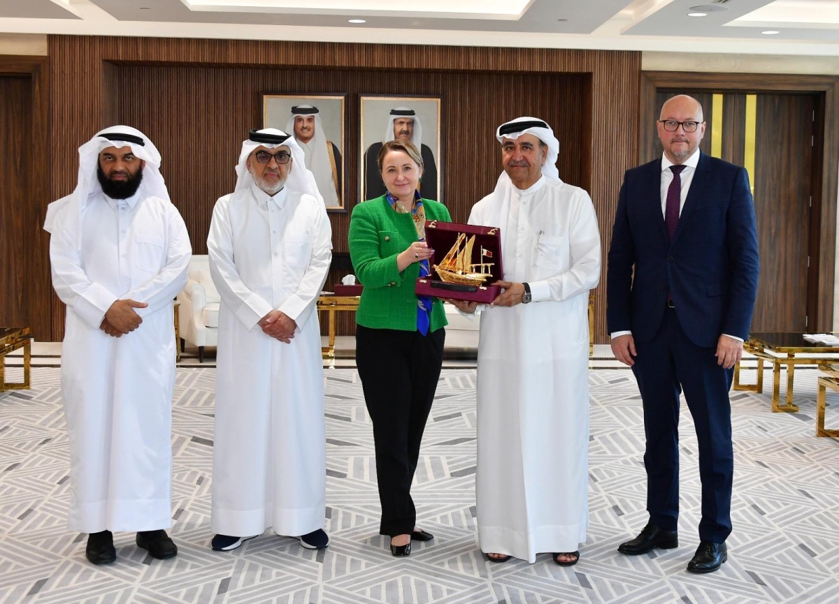 Non-Resident Ambassador of Latvia to Qatar, H E Dana Goldfinča with QC Board Member Abdulrahman bin Abduljalil Al Abdulghani, along with other officials.
