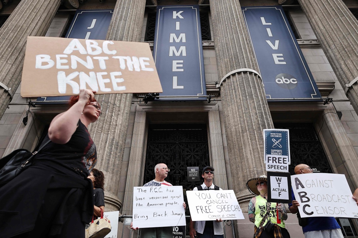 Demonstrators protest the suspension of the 