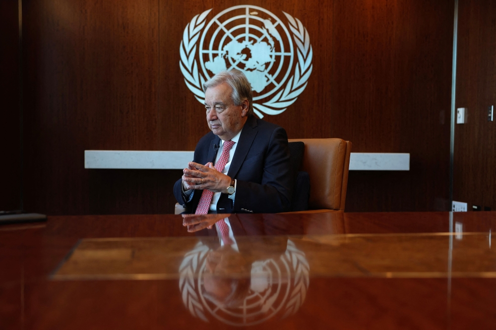 UN Secretary-General Antonio Guterres speaks during an AFP interview ahead of the 80th session of the United Nations General Assembly (UNGA 80) at UN headquarters in New York on September 19, 2025. (Photo by Angela Weiss / AFP)