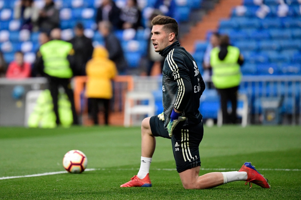 (Files) Real Madrid's French goalkeeper Luca Zidane warms up before the Spanish League football match between Real Madrid CF and SD Huesca at the Santiago Bernabeu stadium in Madrid on March 31, 2019. (Photo by Javier Soriano / AFP)