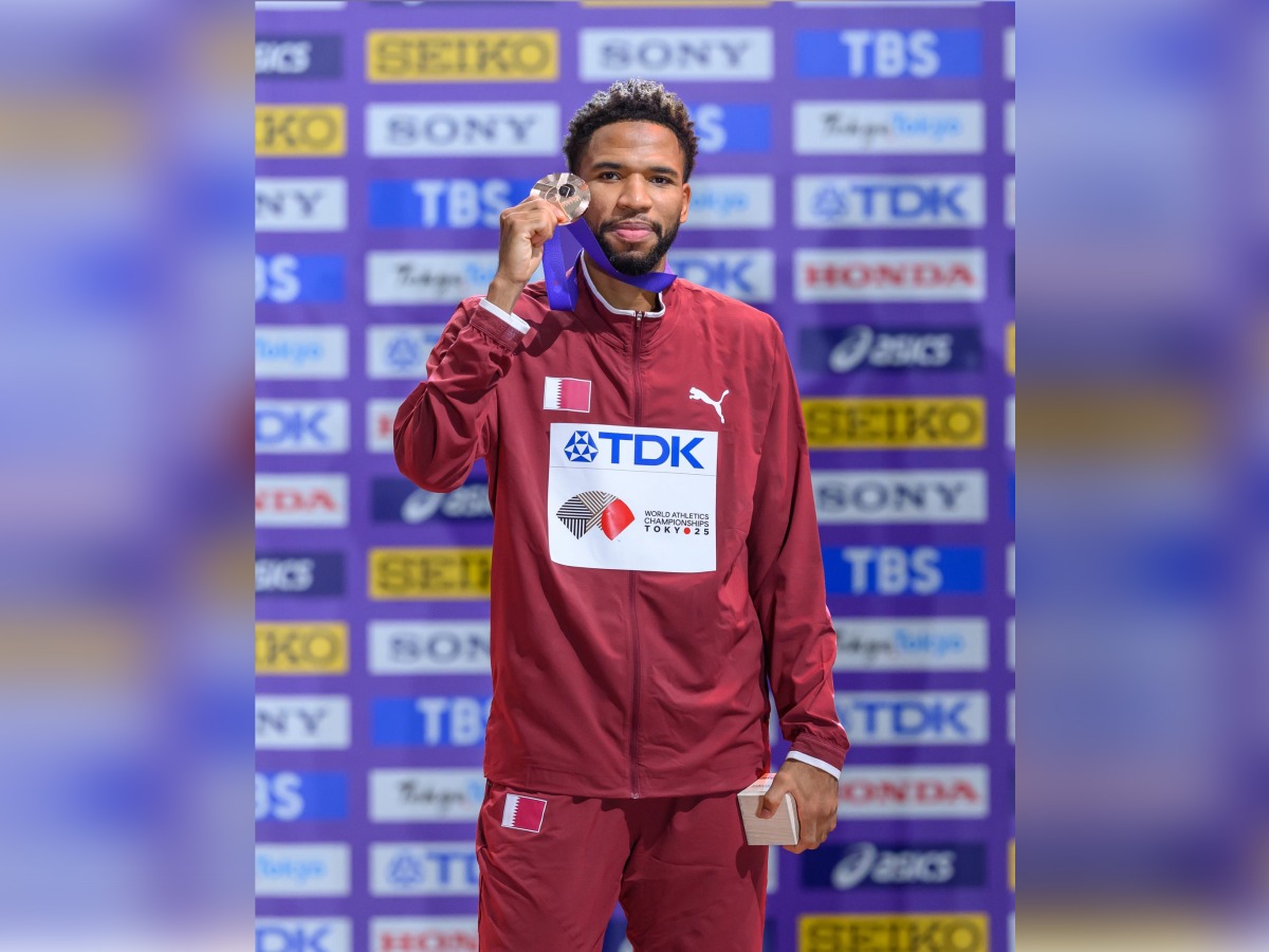 Qatar's Abderrahman Samba poses with his bronze medal.
