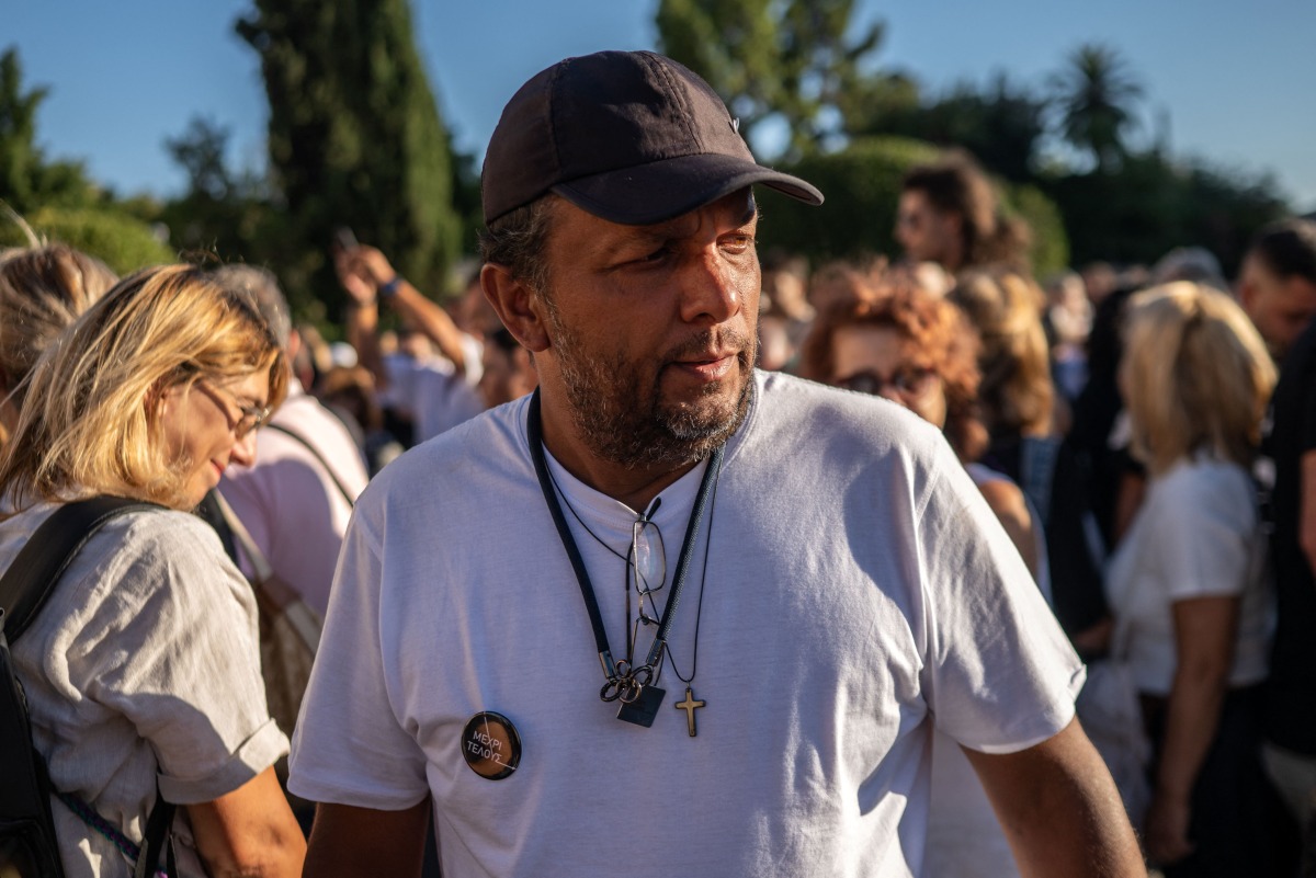 Panos Routsi, father of a boy killed in the Tempi railway collision in February 2023, looks on as he entered his seventh day of a hunger strike to demand that his son's body be exhumed so that the cause of death can be determined through toxicological tests, outside the Greek Parliament in Athens on September 21, 2025. Photo by Angelos TZORTZINIS / AFP