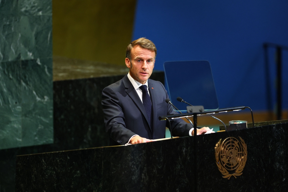 France's President Emmanuel Macron speaks during a United Nations Summit on Palestinians at UN headquarters during the United Nations General Assembly (UNGA) in New York on September 22, 2025. (Photo by Angela Weiss / AFP)