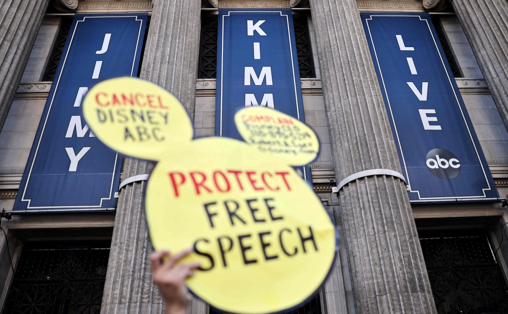 A demonstrator waves a 