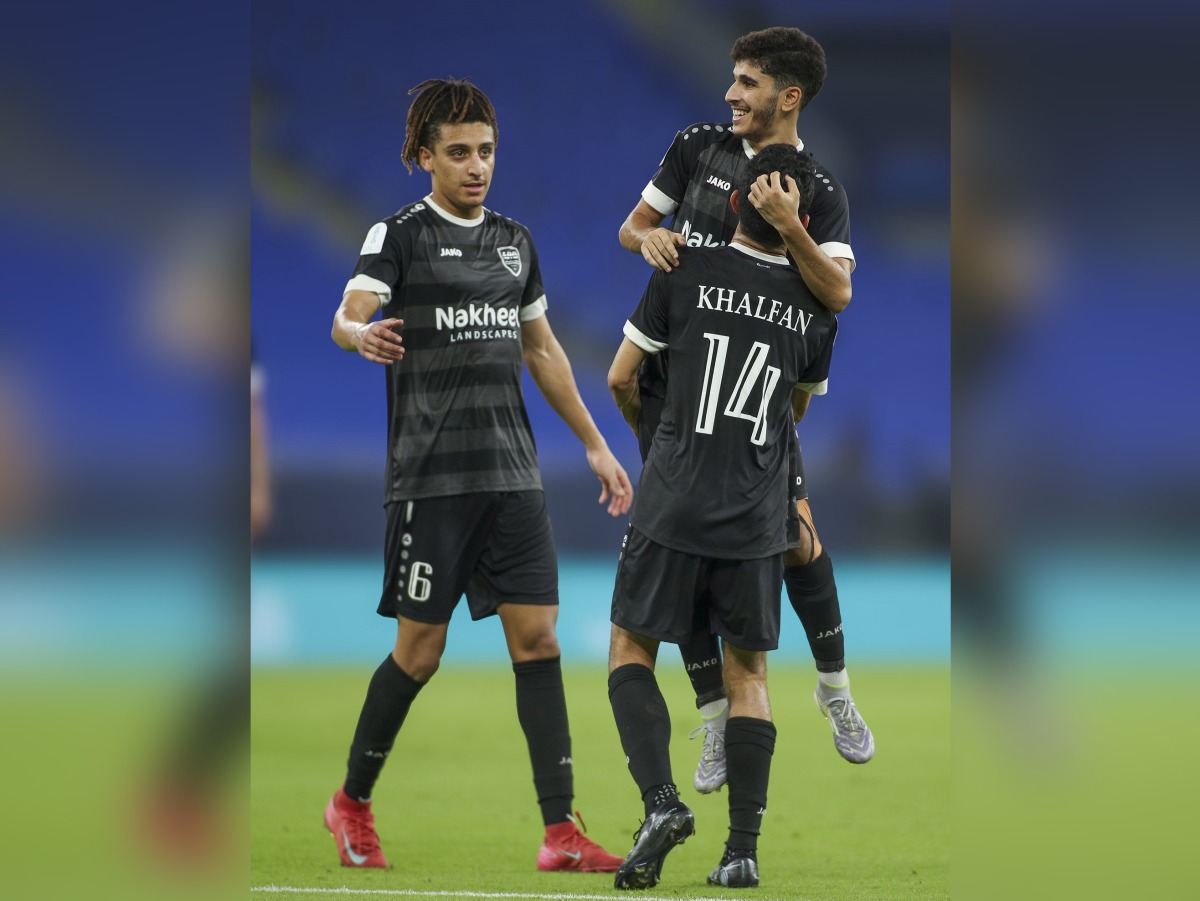 Al Bidda’s Abdallah Ahmed Nouri jumps as he celebrates with teammates during the match against Al Sadd at Stadium 974 yesterday.