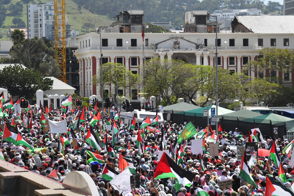 Protesters gather at the South African Parliament during civil society and faith-based organizations’ mass rally for Gaza, in Cape Town on September 27, 2025. (Photo by RODGER BOSCH / AFP)