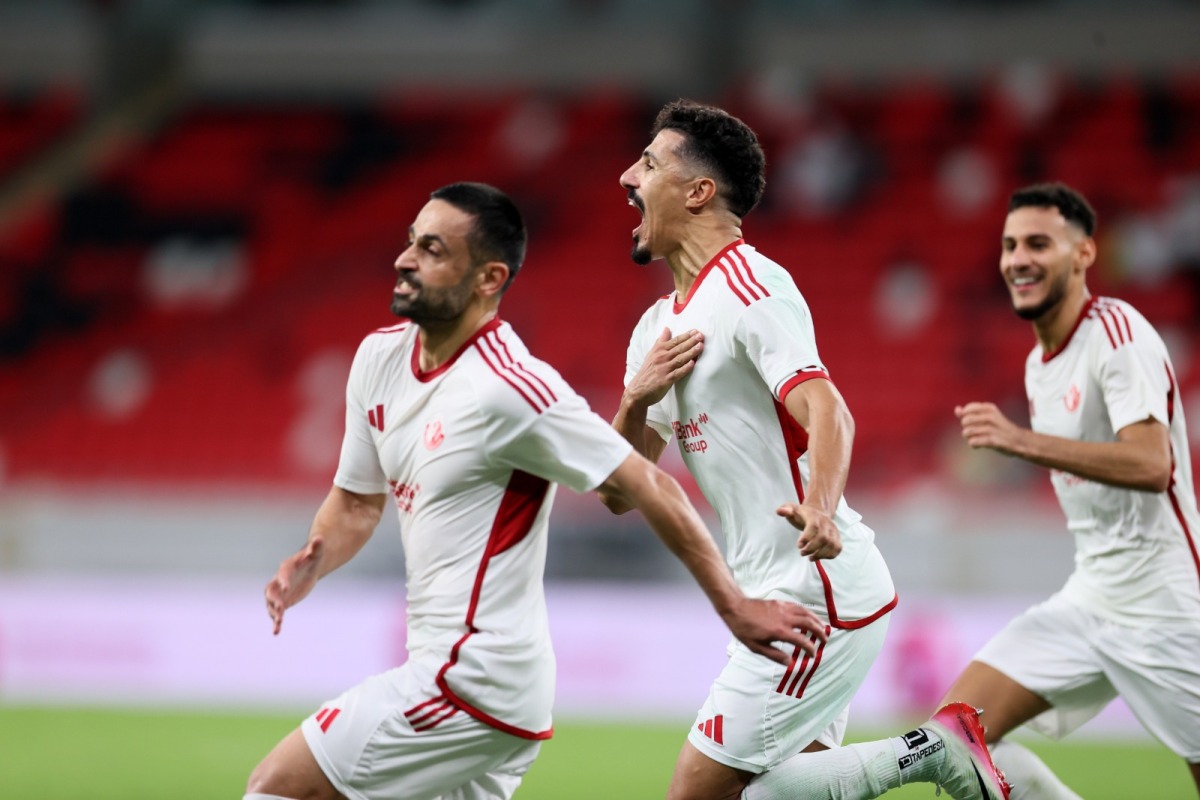Al Shamal’s Omid Ebrahimi (left) celebrates his equaliser with teammates Baghdad Bounedjah (centre) and Mohamed Naceur Manai.