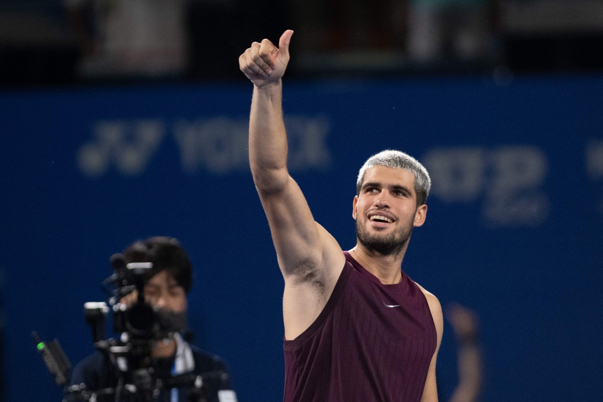 Spain's Carlos Alcaraz reacts after his men痴 singles match against Norway's Casper Ruud at the ATP Japan Open tennis tournament in Tokyo on September 29, 2025. (Photo by Philip FONG / AFP)