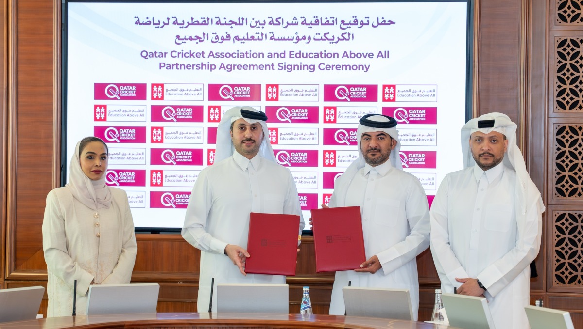 Education Above All Foundation and  Qatar Cricket Association officials during the signing of the agreement.
