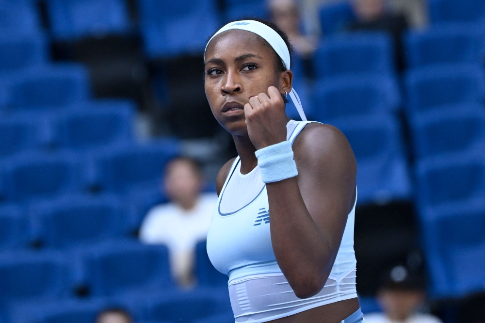 USA's Coco Gauff reacts after victory against Switzerland's Belinda Bencic during their women's singles match at the China Open tennis tournament on September 30, 2025. (Photo by Wand Zhao / AFP)