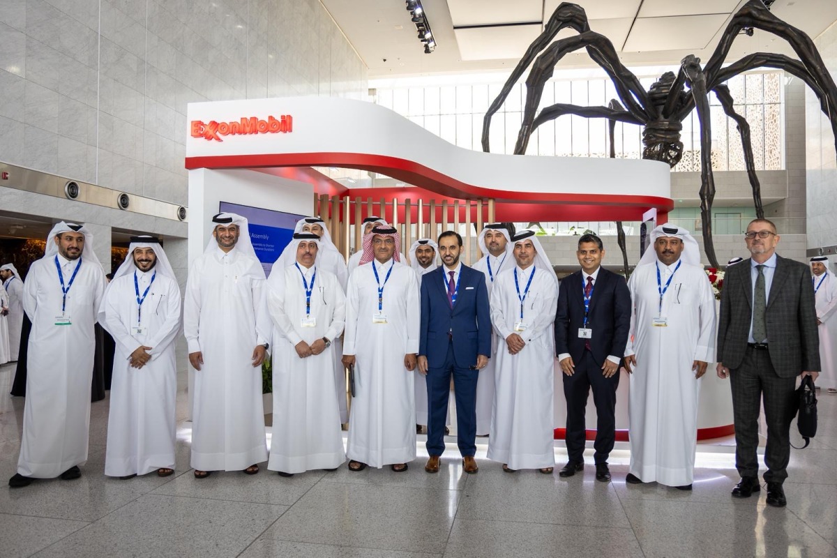 President and General Manager for ExxonMobil Qatar, Taher Hamid, with other officials during the conference.
