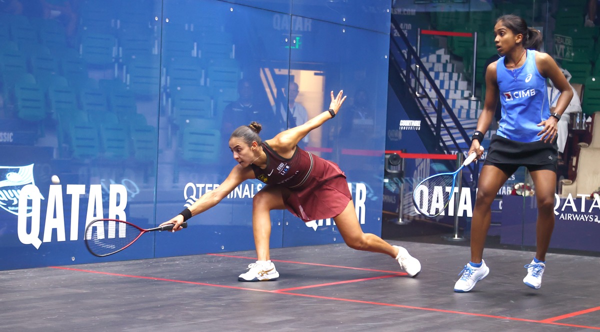 Egypt's Hania El Hammamy (left) in action against Sivasangari Subramaniam of Malaysia.