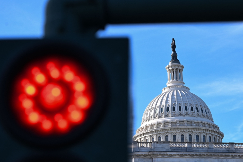 A view of the US Capitol building on the third day of the US government shutdown in Washington, DC, on October 3, 2025. (Photo by Alex Wroblewski / AFP)
