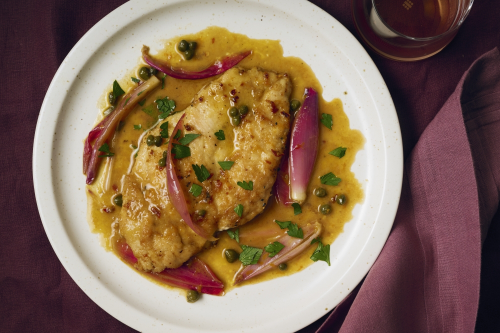 Orange Chicken Piccata With Shallots. Picture: Marvin Joseph/The Washington Post; food styling by Lisa Cherkasky