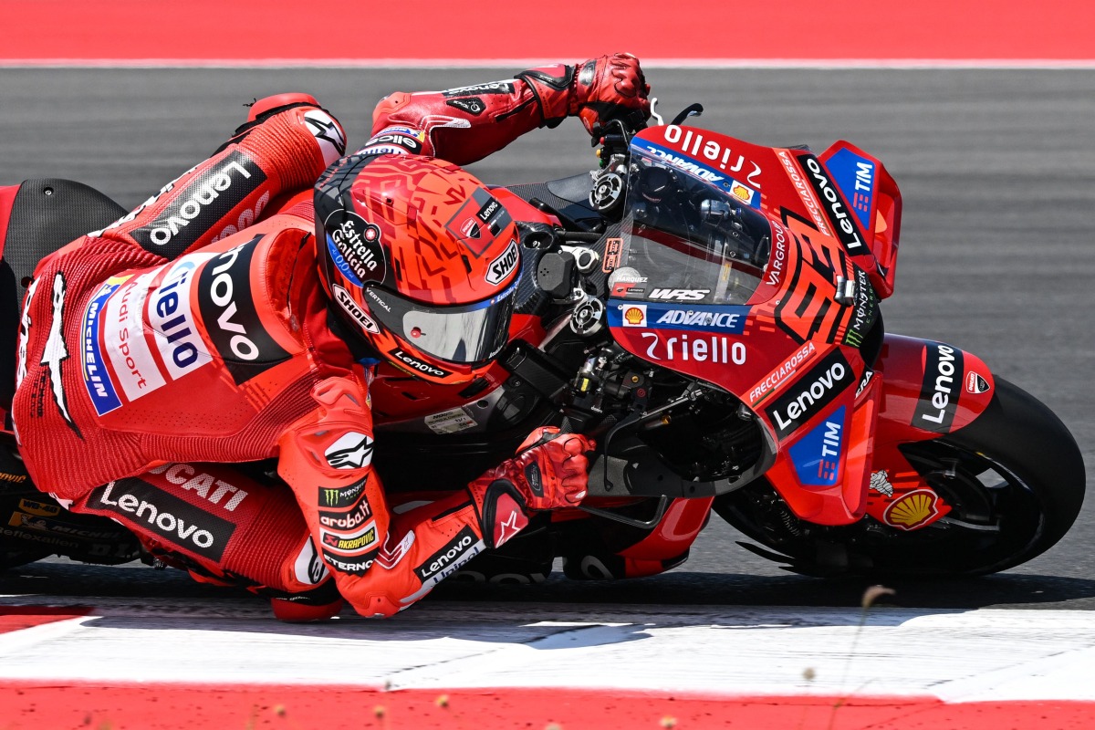 Ducati Lenovo Team's Spanish MotoGP rider Marc Marquez rides during the warm-up ahead of the MotoGP Indonesian Grand Prix at the Mandalika International Circuit in Mandalika, West Nusa Tenggara on October 5, 2025. (Photo by SONNY TUMBELAKA / AFP)