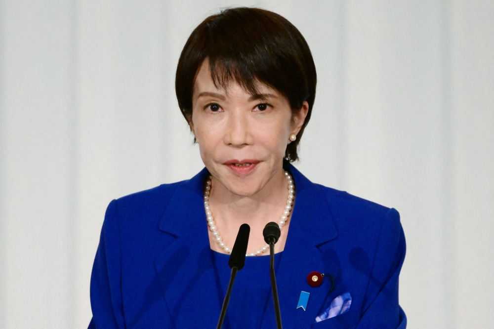 Sanae Takaichi, the newly-elected leader of Japan's ruling party, the Liberal Democratic Party (LDP), attends a press conference after the LDP presidential election in Tokyo on October 4, 2025. (Photo by Yuichi Yamazaki / POOL / AFP)
