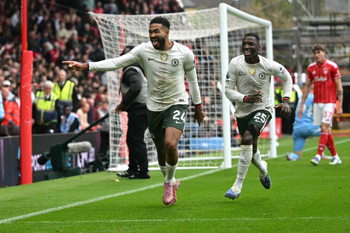 Chelsea's English defender Reece James celebrates scoring the team's third goal during the English Premier League football match between Nottingham Forest and Chelsea at The City Ground in Nottingham, central England, on October 18, 2025. (Photo by JUSTIN TALLIS / AFP) 