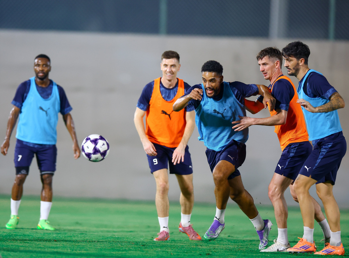 Al Duhail players attend a training session to prepare for their match against Al Wahda FC.  