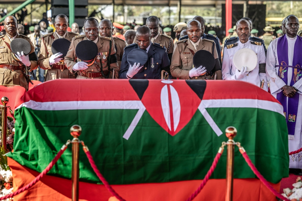 The coffin is carried by officials during the final day of funeral proceedings for Odinga at the Jaramogi Oginga Odinga University grounds in Bondo, on October 19, 2025. (Photo by Luis Tato / AFP)