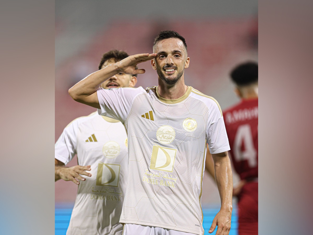 Al Arabi's Pablo Sarabia celebrates after scoring his team's fourth goal.