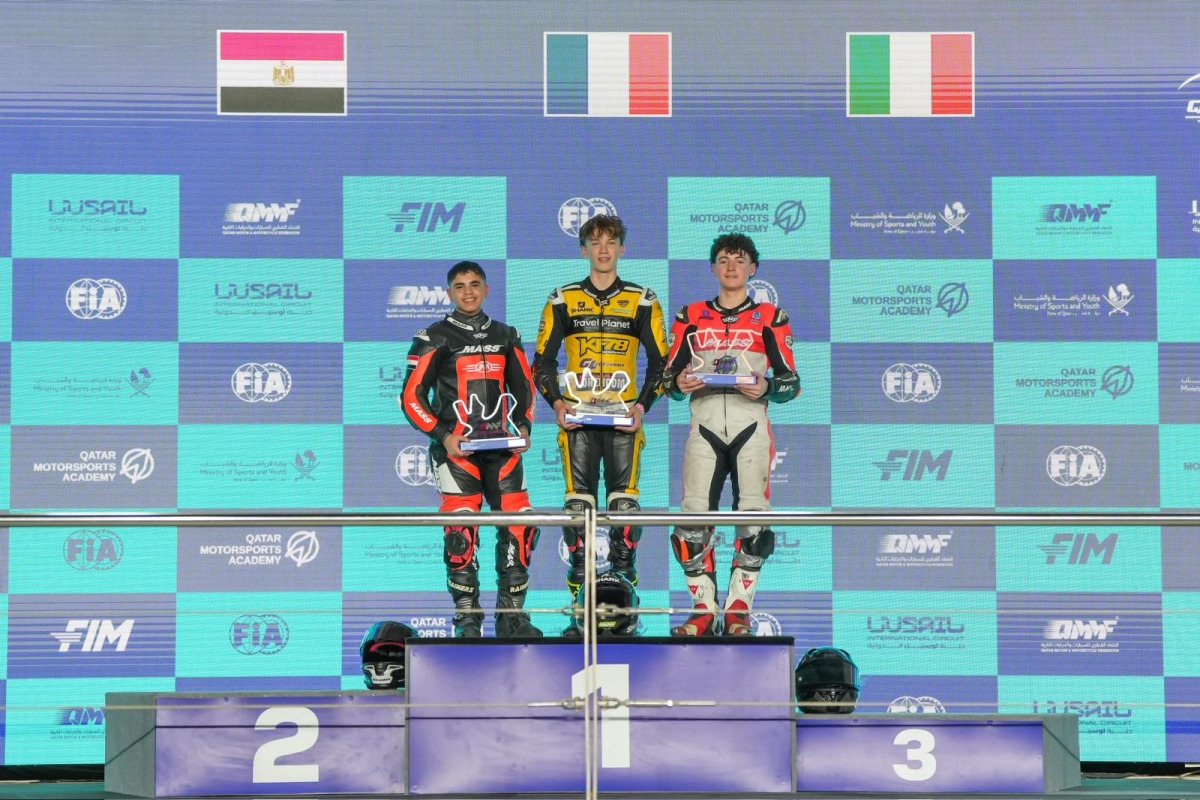 QSSP 300 Race 2 podium winners celebrate on the podium. 