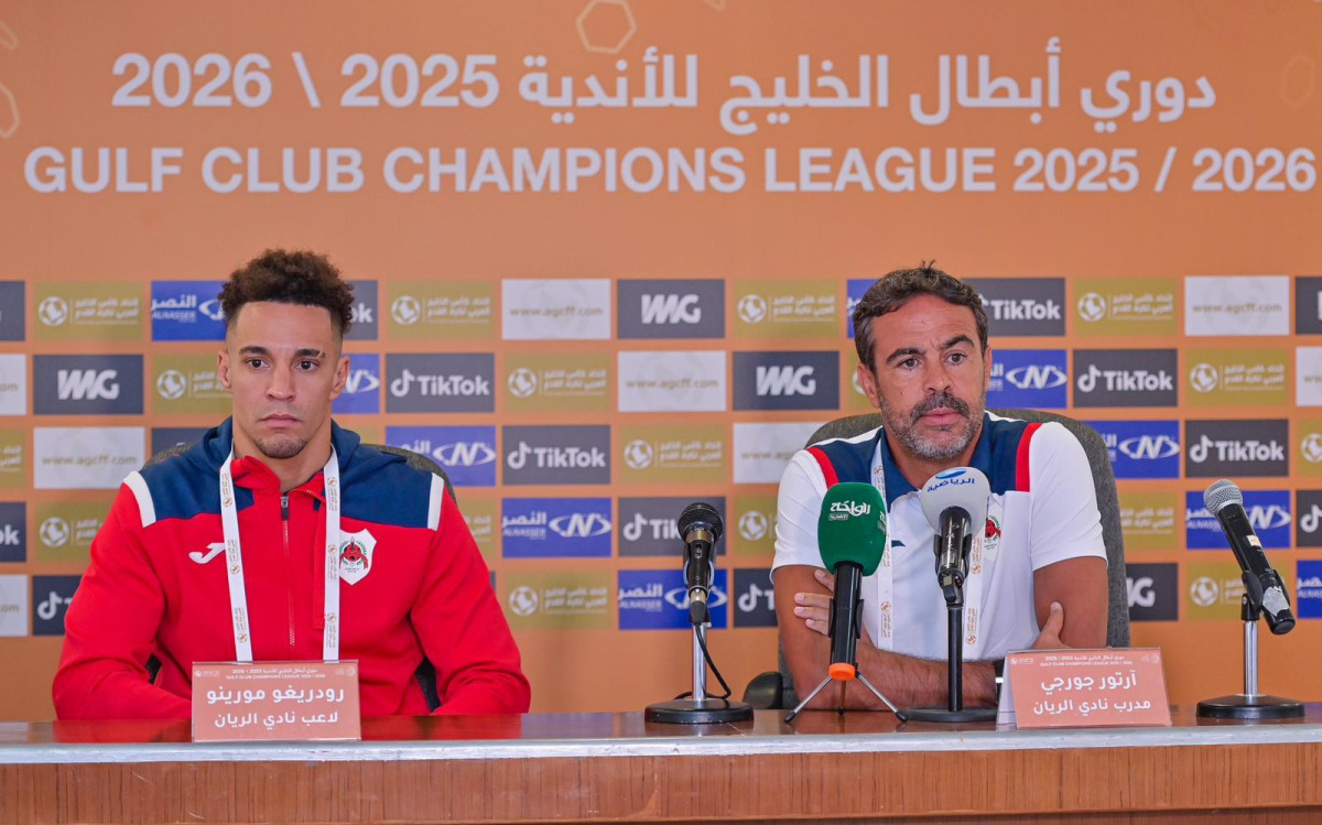 Al Rayyan coach Artur Jorge and forward Rodrigo Moreno attend a press conference.