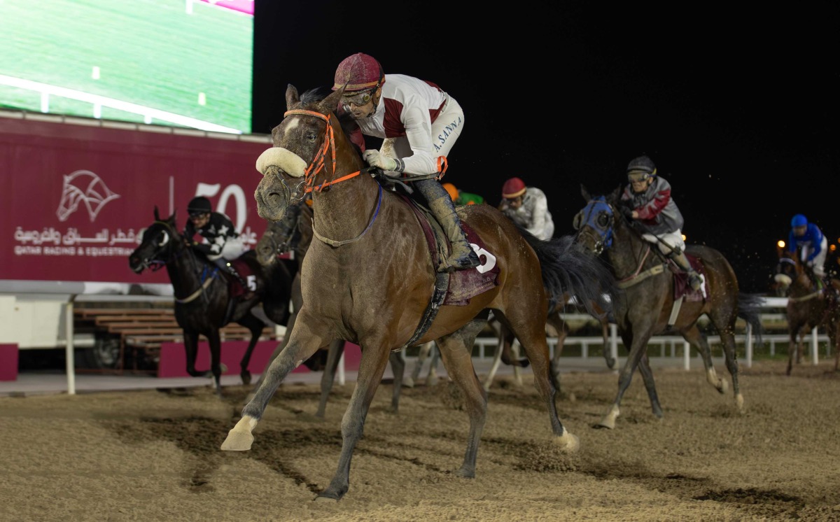 Grace Secret storms ahead under jockey Alberto Sanna. Photo: Juhaim/QREC 