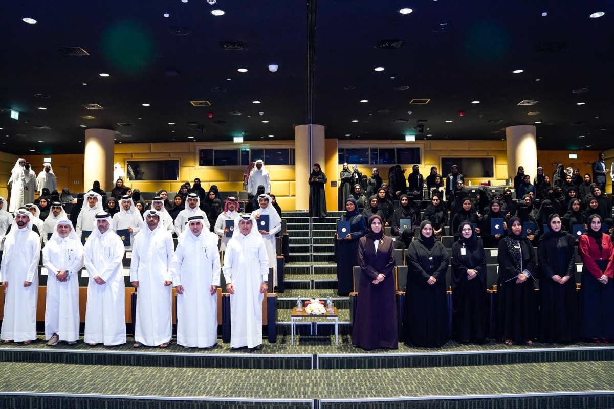 Minister of Education and Higher Education H E Lolwah bint Rashid bin Mohammed Al Khater with other officials and honourees during the event.