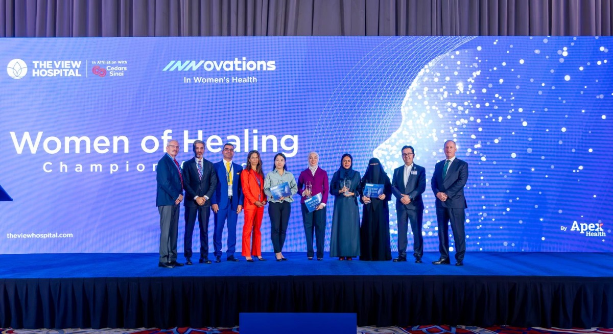 The View Hospital CEO Dr. Fatih Mehmet Gul and other officials with award recipients at the symposium.