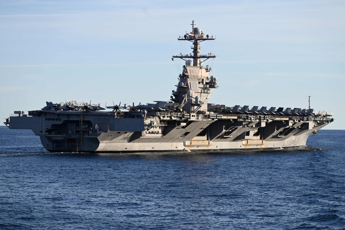 (FILES) The USS Gerald R. Ford, the world's largest aircraft carrier, seen in the North Sea during NATO Neptune Strike 2025 exercise on September 24, 2025 in the North Sea. (Photo by Jonathan KLEIN / AFP)