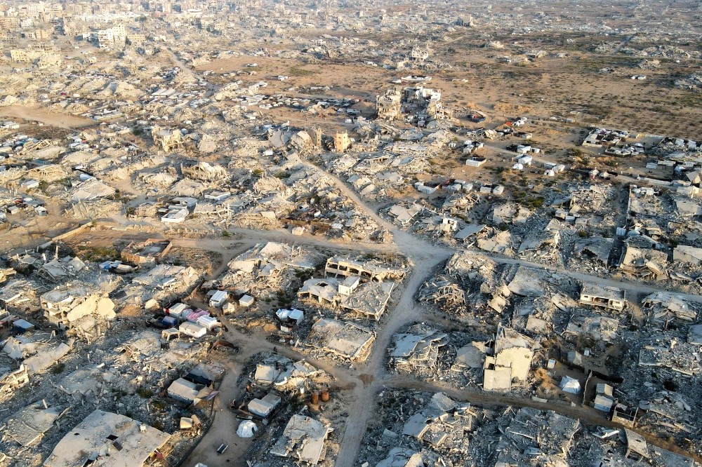 This aerial picture shows destroyed buildings in Gaza City's Al-Remal neighbourhood on October 23, 2025. (Photo by AFP)