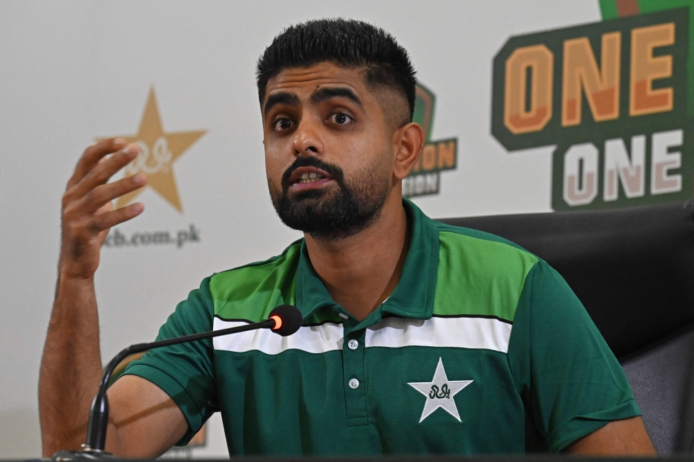 (FILES) Pakistan's cricket team captain Babar Azam speaks during a press conference at the Gaddafi Stadium in Lahore on September 26, 2023. (Photo by Arif Ali / AFP)