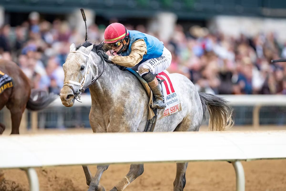 Jockey Irad Ortiz Jr, and Hit Show on their way to win the race.
