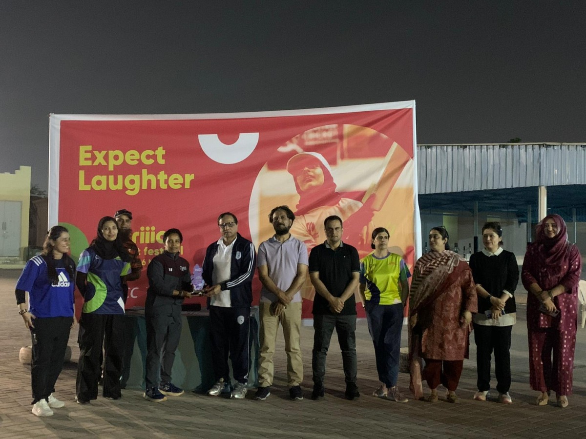 PISQ Principal Ch. Muhammad Afzal with staff and players at the event.