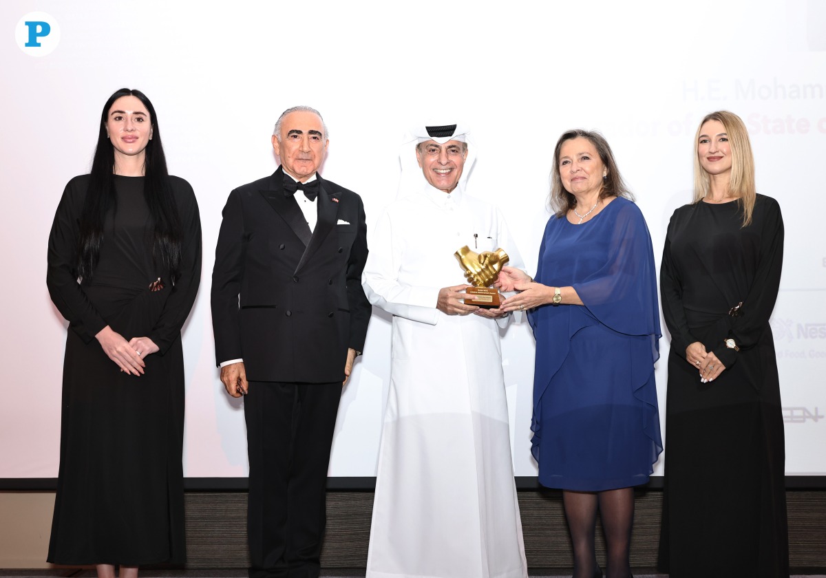 Ambassador of Qatar to Switzerland, H E Mohammed bin Jaham Al Kuwari receiving the award from Ambassador of Switzerland to Qatar, H E Florence Tinguely Mattli during the ceremony. Pic: Salim Matramkot/The Peninsula
