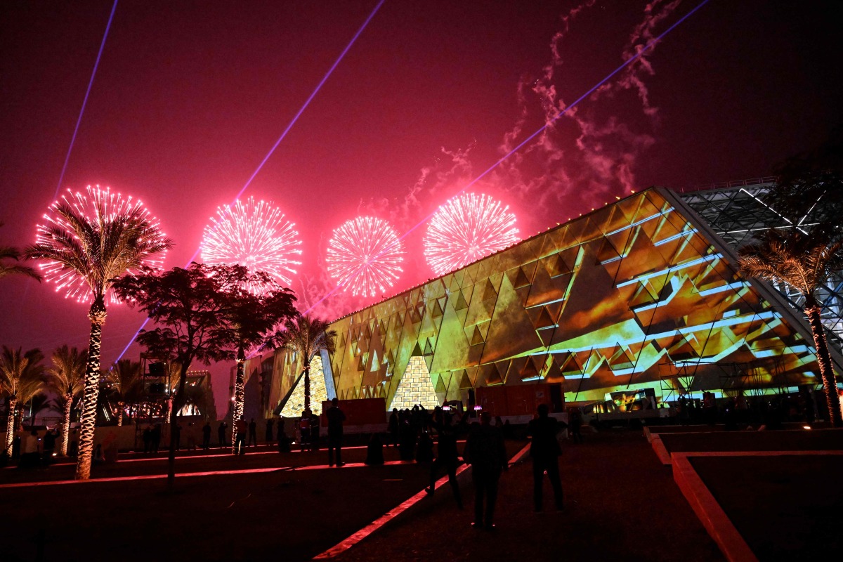 Fireworks light up the sky during the opening ceremony of the Grand Egyptian Museum (GEM) in Giza, on the southwestern outskirts of the capital Cairo on November 1, 2025. (Photo by Khaled DESOUKI / AFP)
