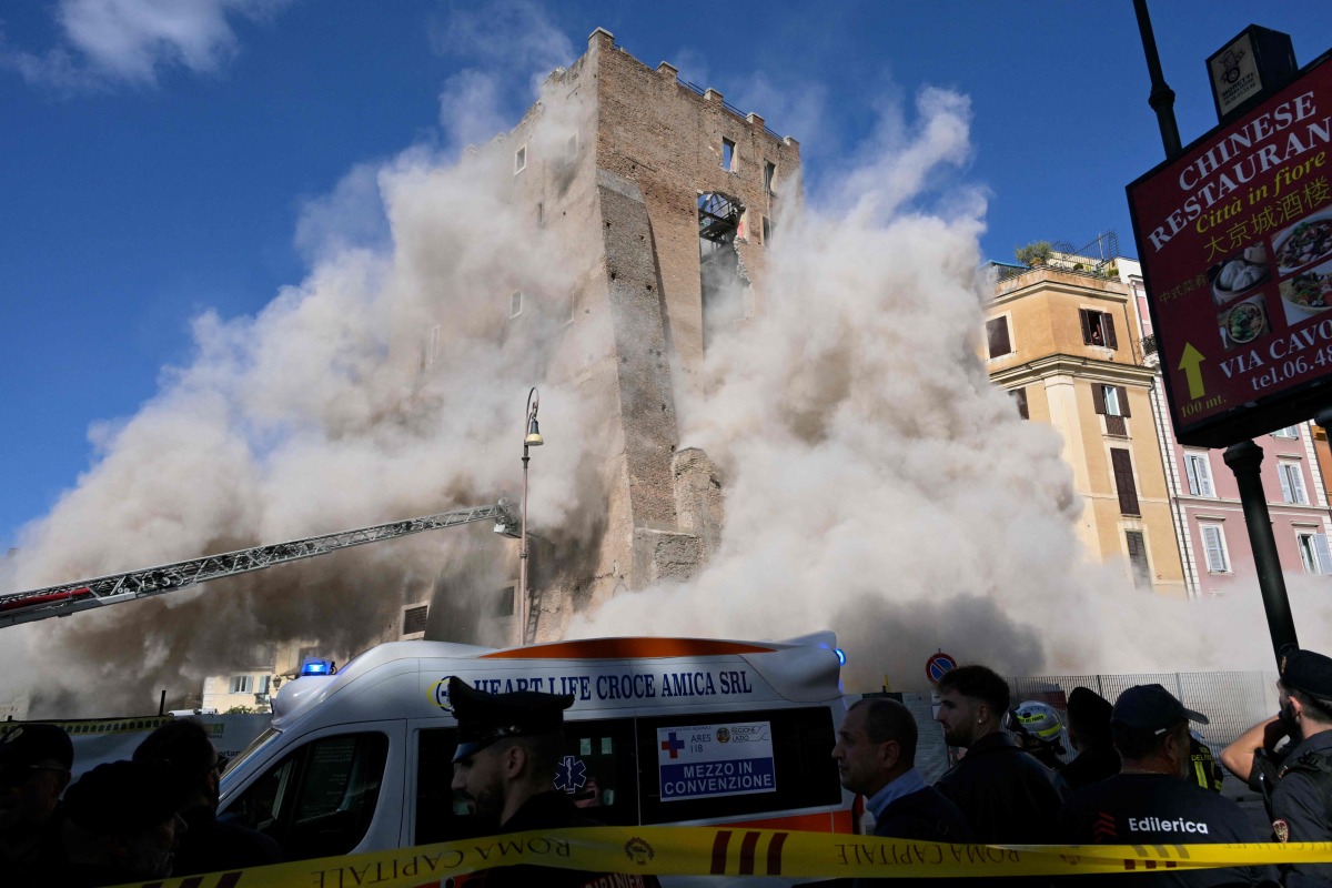 Dust rises due to a second collapse of part of the medieval tower 