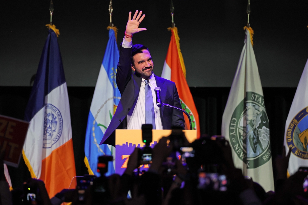 New York City Mayoral candidate Zohran Mamdani celebrates during an election night event at the Brooklyn Paramount Theater in Brooklyn, New York on November 4, 2025. (Photo by Angela Weiss / AFP)