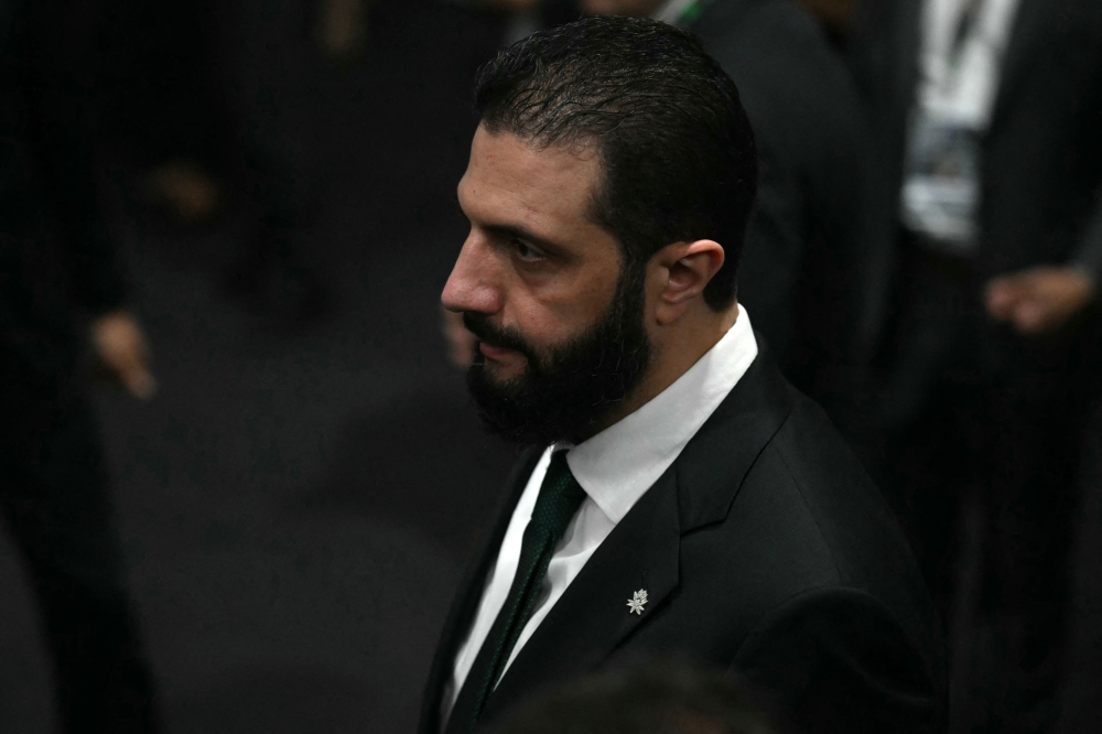 Syria's President Ahmad Al Sharaa at the COP30 UN Climate Change Conference in Belem, Para State, Brazil, on November 6, 2025. (Photo by Mauro PIimentel / AFP)
