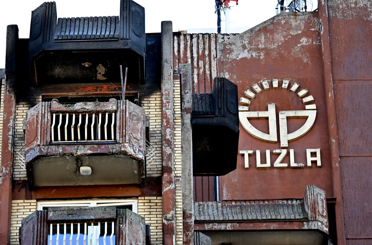 This photograph shows the burnt facade of a nursing home where a deadly fire broke out the day prior in the north-eastern Bosnian city of Tuzla, on November 5, 2025. Photo by ELVIS BARUKCIC / AFP