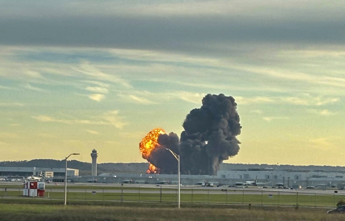 This handout photo courtesy of Levi Dean shows smoke and flames rising from the site of a UPS cargo plane crash outside Louisville International Airport in Louisville, Kentucky, on November 4, 2025. Photo by HANDOUT / Courtesy of X account @LeviDean98 / AFP